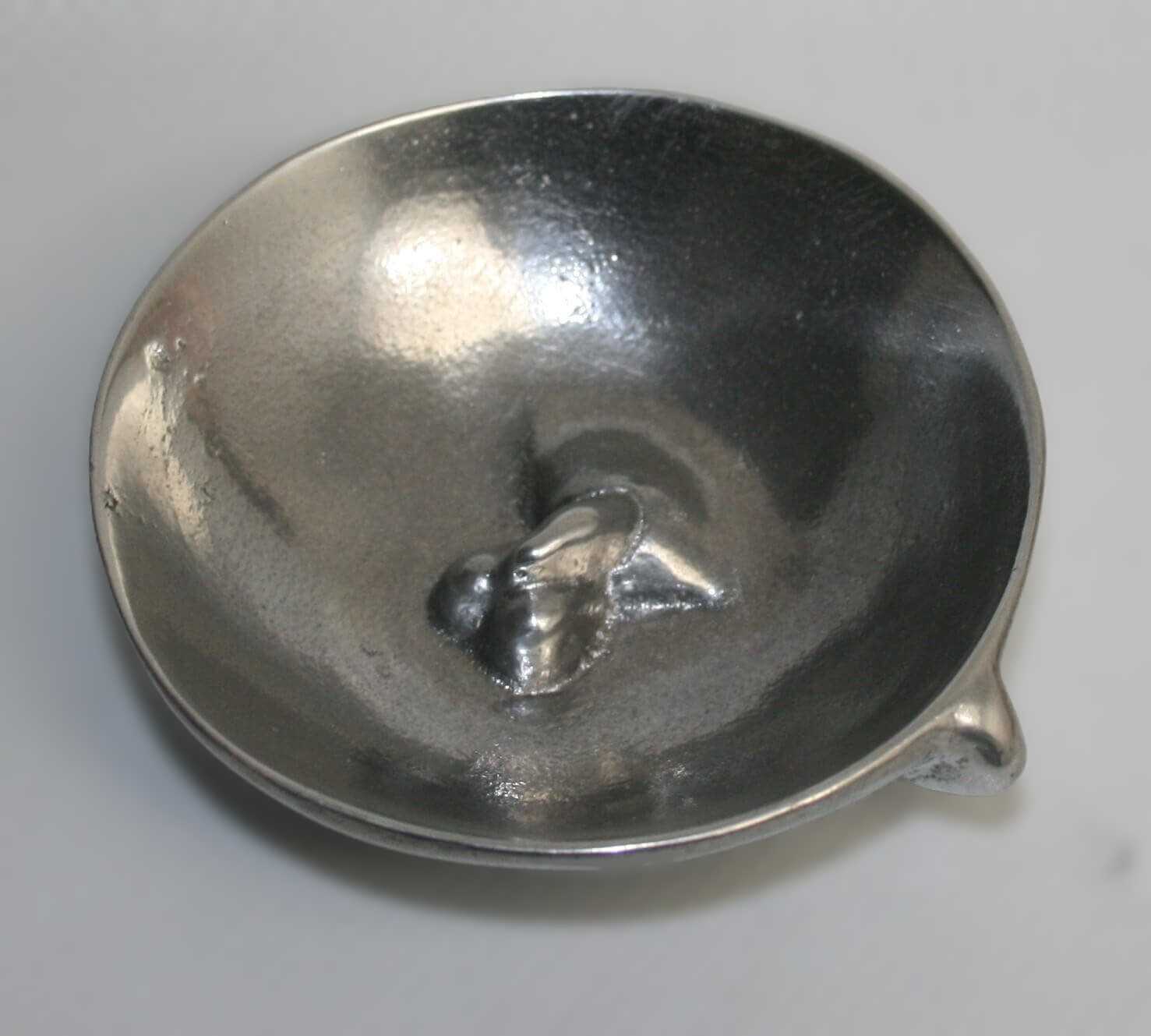 Stelios Gavalas aluminium box sculpture of a gold bowl.