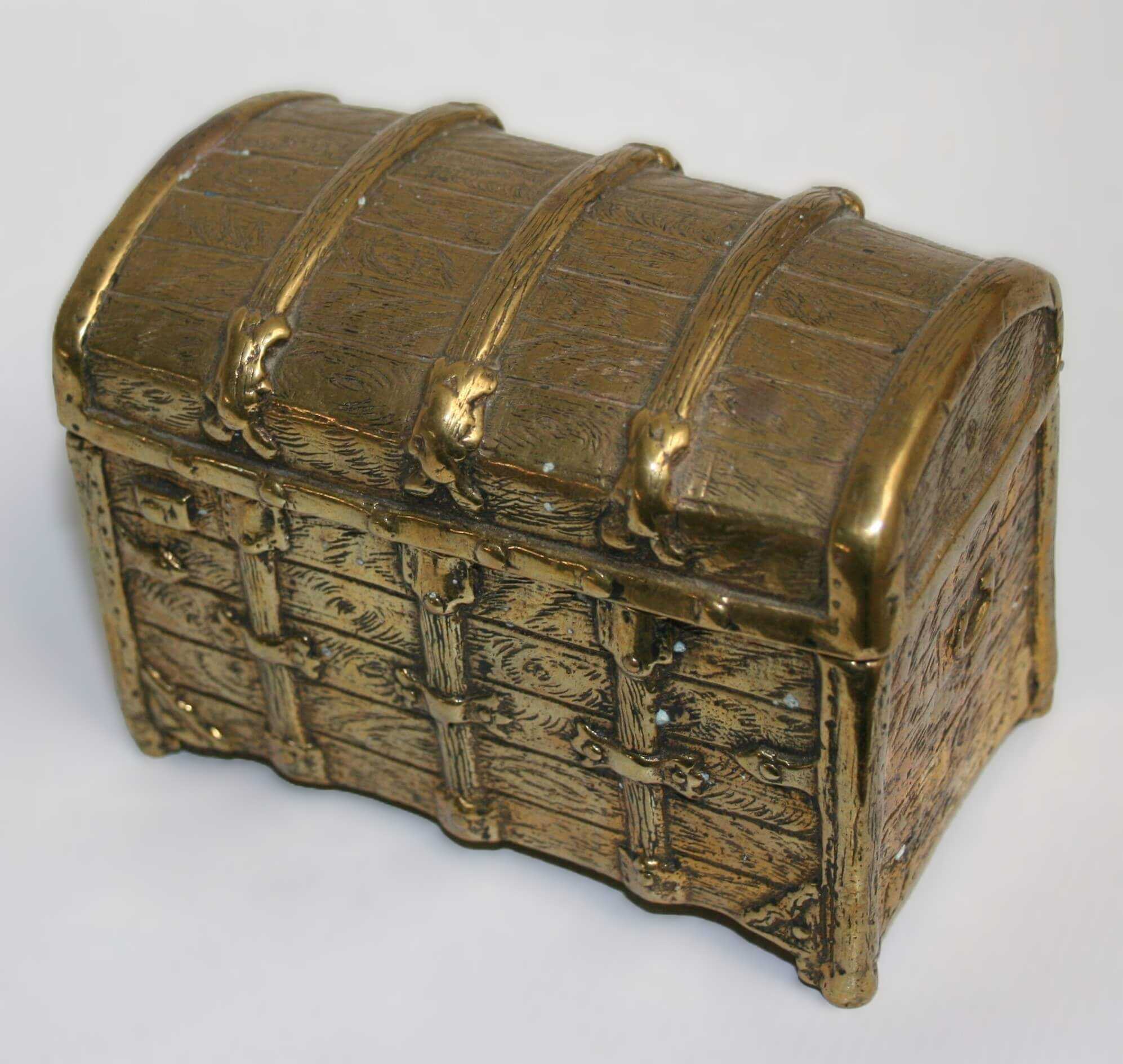 Stelios Gavalas aluminium box sculpture of a gold treasure chest.