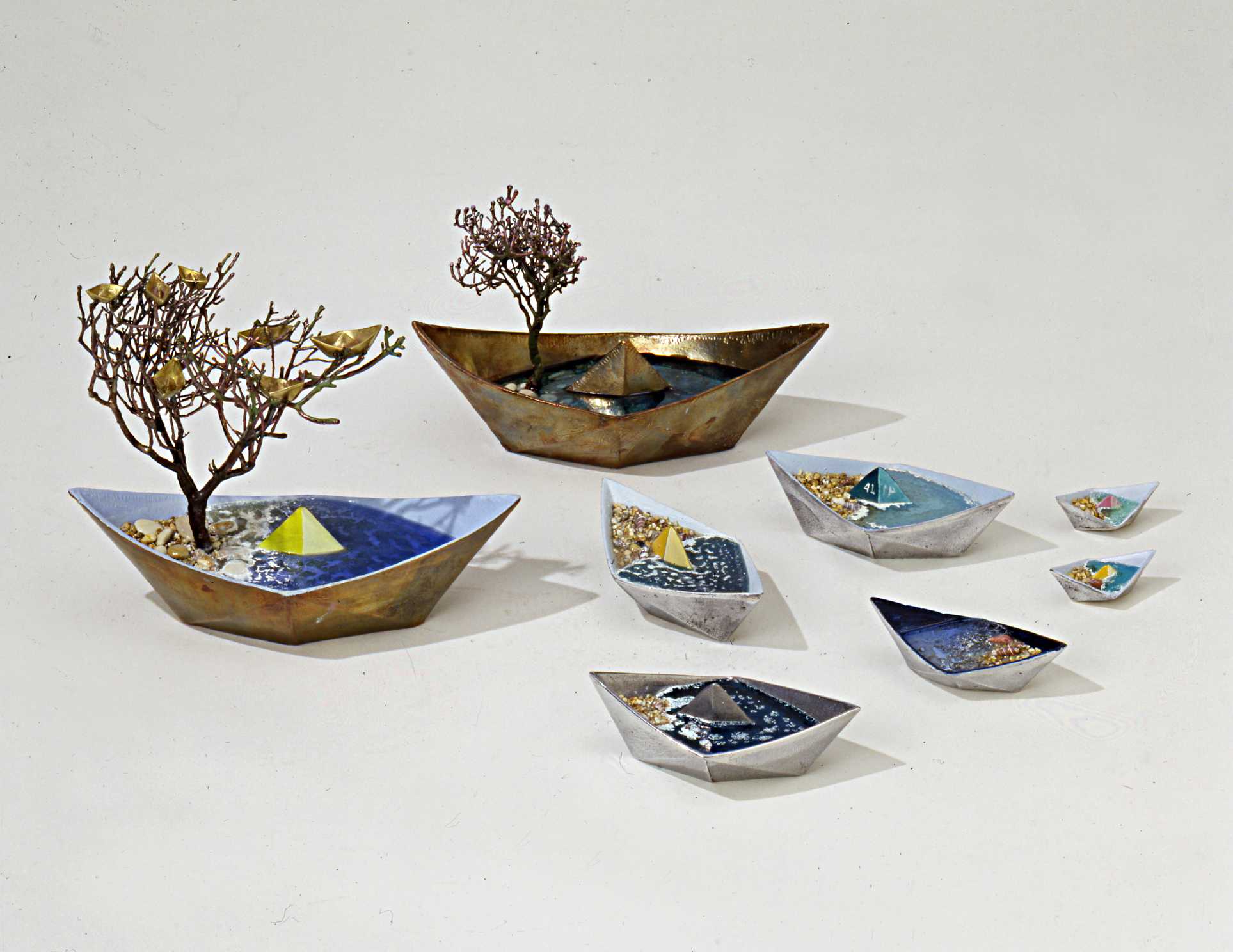 Stelios Gavalas sculpture from aluminium boats with and island and rough sea water - 2.