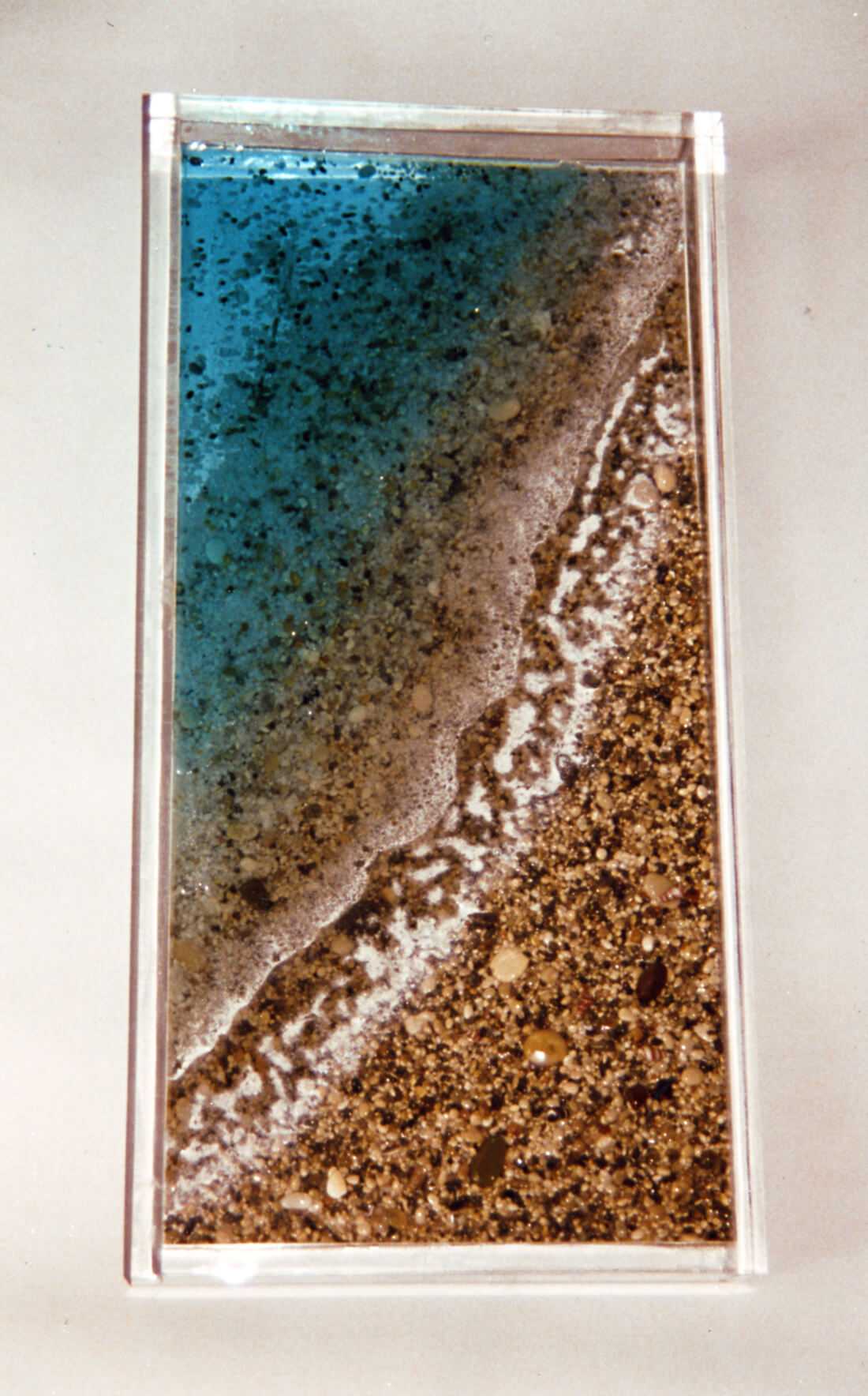 Stelios Gavalas Sculpture: Beach with sand and pebbles and variations of blue water